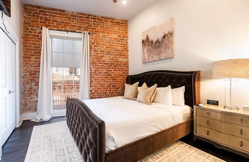 Arts/Warehouse District Condo | 📣New XL Luxury Corner Condo PRIME Historic Downtown Location HUGE Balcony Wrapped in Wrought Iron
