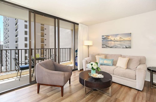 Waikiki Condo | Partial Ocean View, one-bedroom with AC, Wi-Fi, parking, short walk to beach!