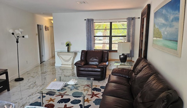 Cozy Duplex overlooks the water and is within walking distance of the beach!